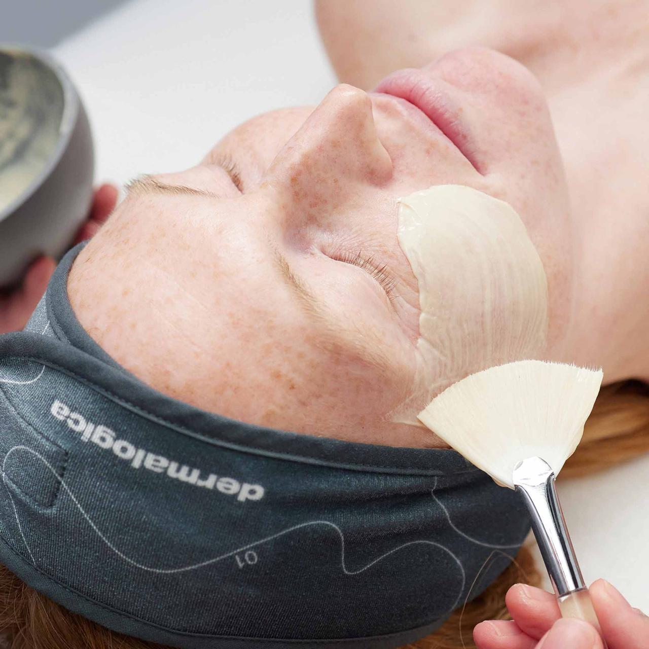 Professional Dermalogica facial treatment being applied